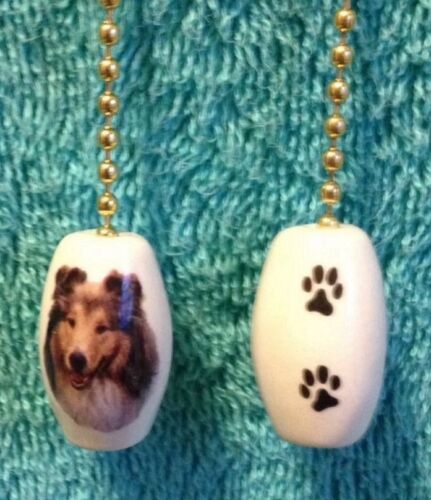 One Sheltie Dog Fan Pull With Paw Prints On The Back 1"